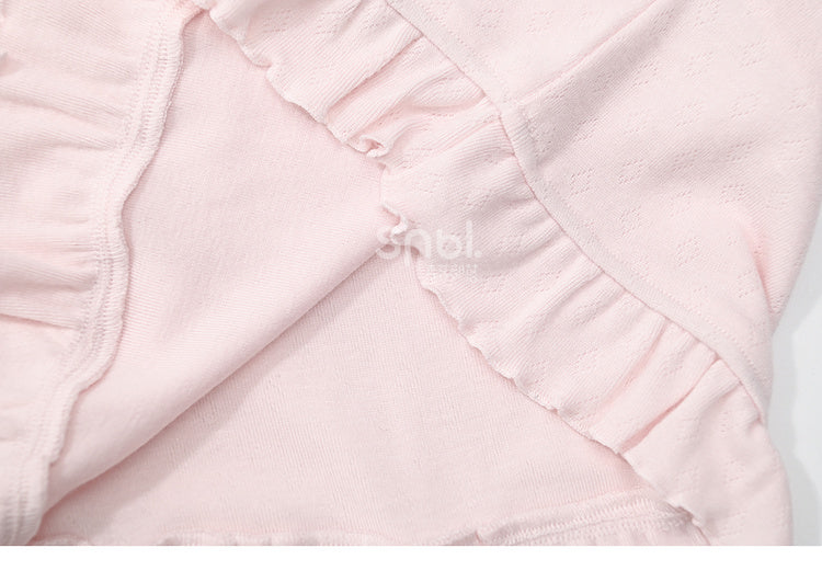 Rosafarbenes, langärmliges Oberteil mit Rüschenbesatz und Schleifendetails