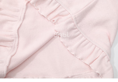 Rosafarbenes, langärmliges Oberteil mit Rüschenbesatz und Schleifendetails