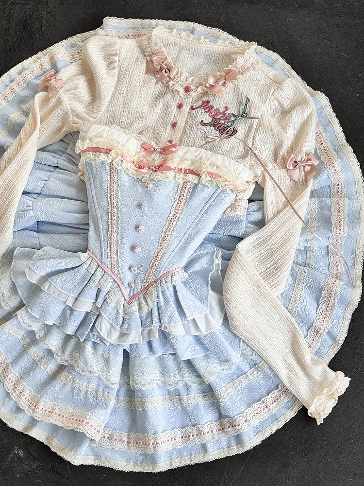 クリーム色の刺繍ディテールの長袖ニットトップス