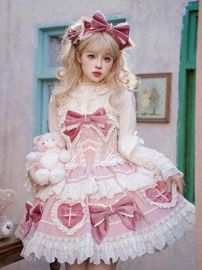 ピンクの蝶結びとハート型のアップリケスカートのスイートロリータドレス