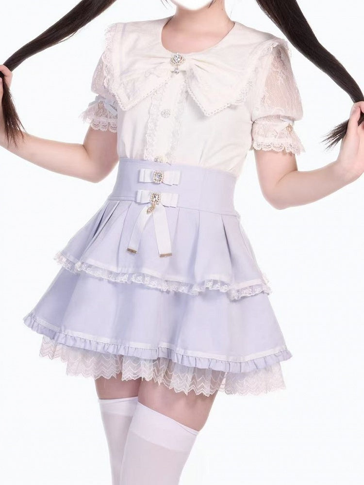 Kei Jirai – Bluse mit weißem Kragen und Schleife