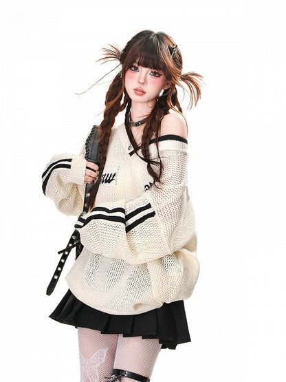 Schwarz/weißes, asymmetrisches Oberteil mit Sonnenschutz und Hohlsaum