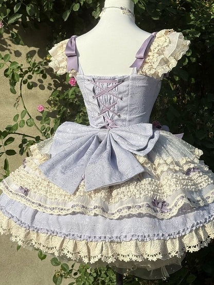 / 紫の大きな青いリボン