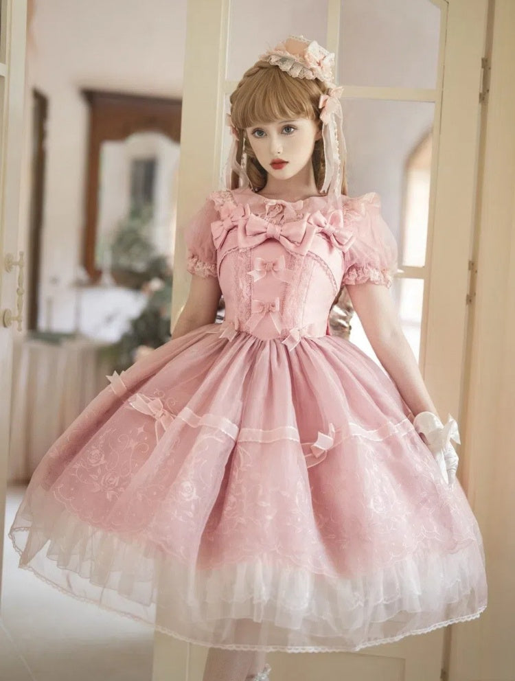 Rosa Bluse mit Puffärmeln und Peter-Pan-Kragen