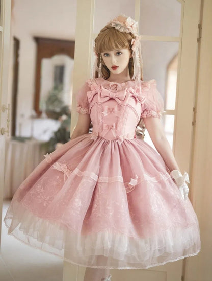 Rosa Bluse mit Puffärmeln und Peter-Pan-Kragen