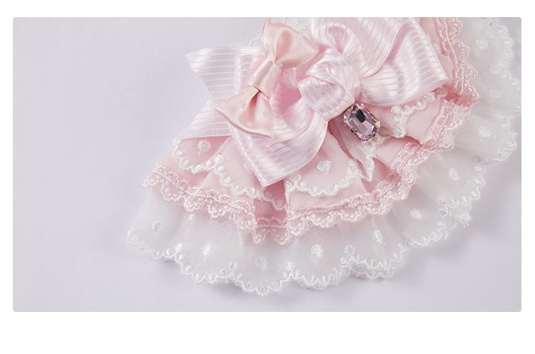 Rosa/weiße Handfesseln mit Schleife