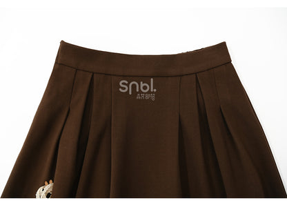 ブラウンの蝶結びディテール、足首丈スカート、チェック柄、フリル裾