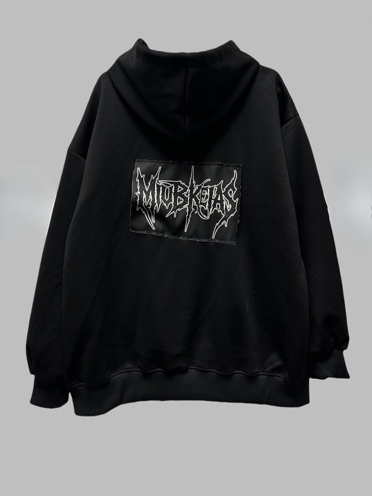 Schwarze Jacke mit Zweiwege-Knopfleiste und Reißverschluss