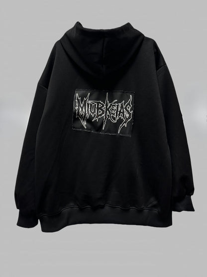 Schwarze Jacke mit Zweiwege-Knopfleiste und Reißverschluss