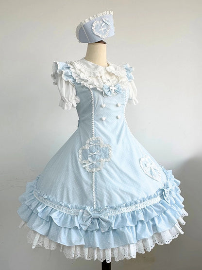 Blaues Lolita-Kleid mit Rüschensaum und Lagenmuster und Polka-Dot-Muster