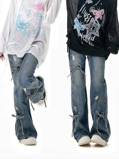 Jeans mit Schleifenakzenten, Schlaghose, Blau, verblasste Waschung, Distressed-Löcher, leicht
