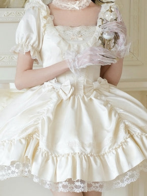 Beige Brosche mit Schleife