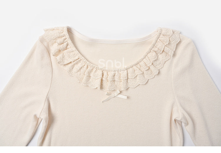 Beiges Slim-Fit-Top mit Spitzenbesatz und Rundhalsausschnitt