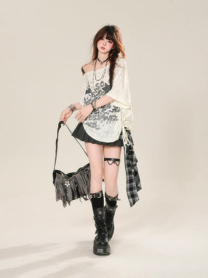 ダークグレーのチェック柄パッチワークデザイン、アシンメトリーヘムのグラマラスプリーツスカート