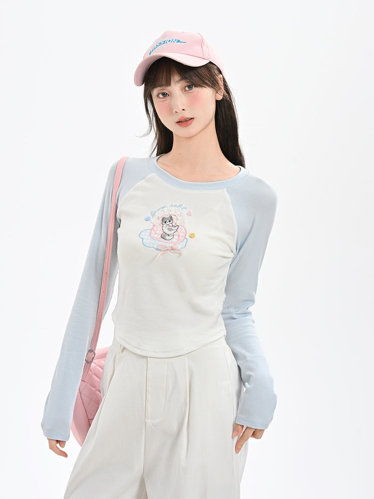 Haut brodé chaton de dessin animé, design colorblock bleu et blanc