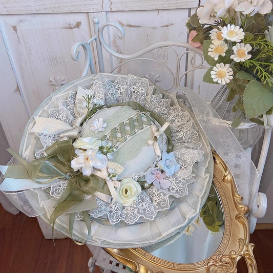 Floral Design and Green Bow Decorated Hat