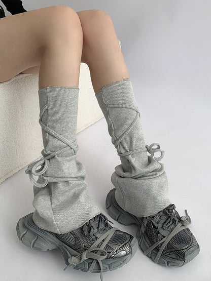 Flared Gray/White Warmers Strappy Leg Design