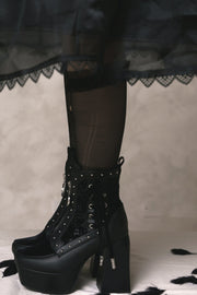 Platform and block heel shown while worn