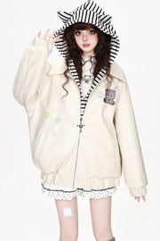 Apricot zip-front jacket worn with hood up