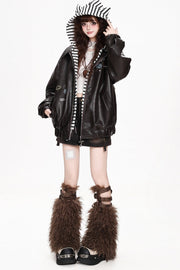 Deep brown jacket styled with short skirt