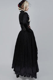 Side view of black floral-trimmed hat