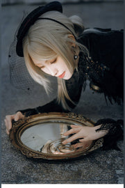 Black hat worn with Gothic lace outfit