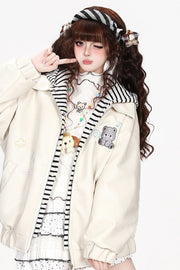 Apricot jacket collar and striped hood detail