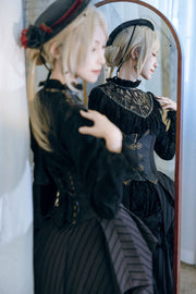 Black veiled hat shown in mirror styling