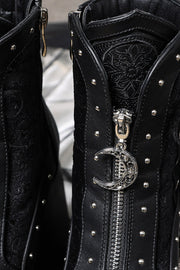 Embroidered tongue detail and crescent zipper charm