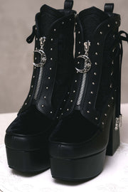 Front zippers and crescent-shaped hardware