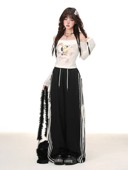 Schwarze Blokette Core-Hose mit weitem Bein und Spitzenbesatz