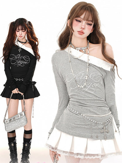 Grau/schwarzes Oberteil mit asymmetrischem Ausschnitt, Seitenschlitzen und langen Ärmeln