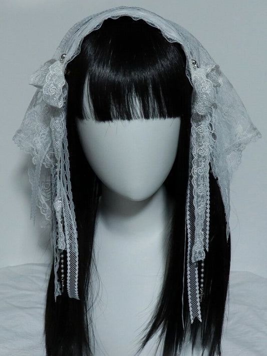 クロスベールヘアバンドとブラック/ホワイトレースの花柄チャームディテールの蝶結び