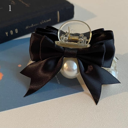 ビーズの蝶結びの黒い爪クリップ装飾