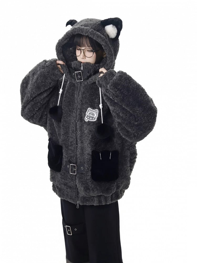 Close-up of zipped gray plush coat with buckle collar and paw-style pockets