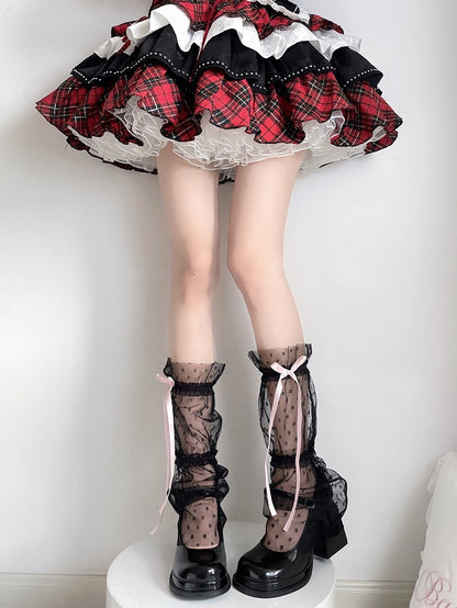 ブラックのセミシアー水玉模様ボウレッグスリーブ