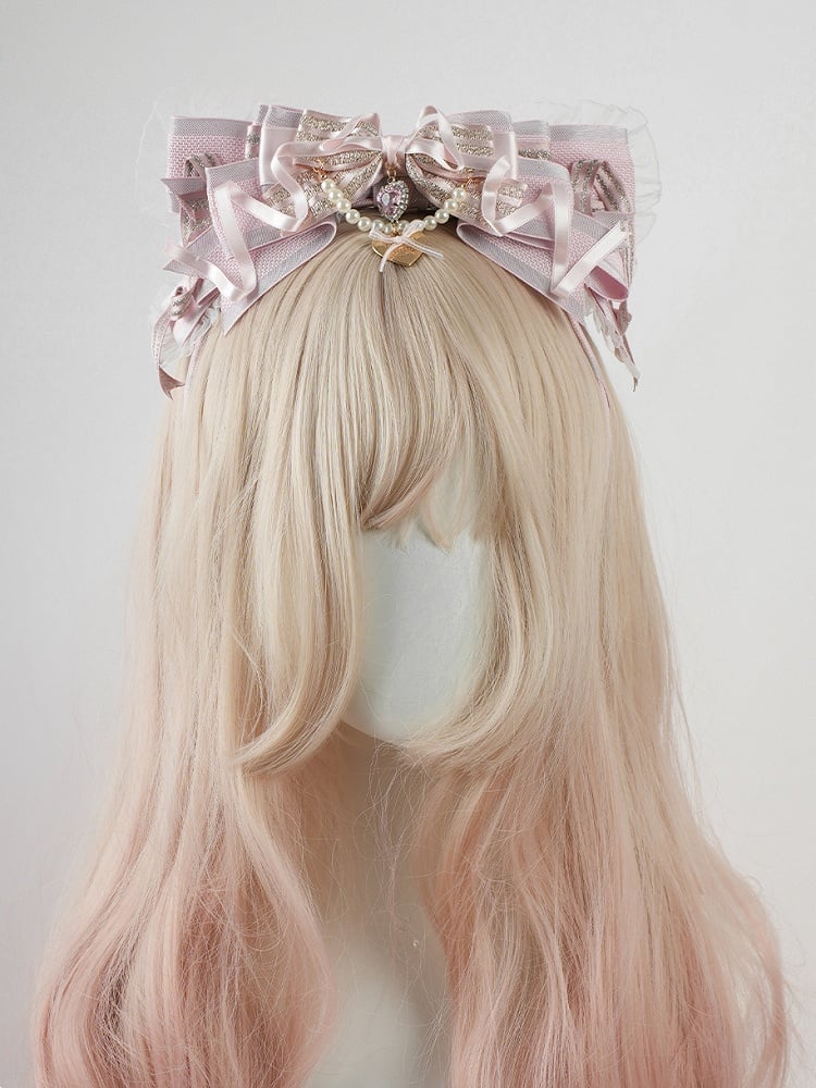 ロリータピンクの大きなリボンビーズチェーンとハートチャームレーストリムKC