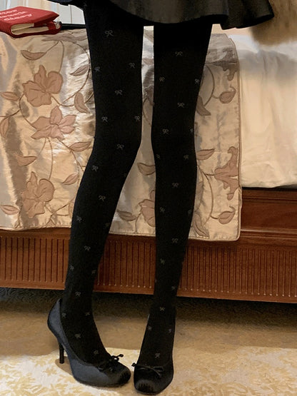 蝶結び柄タイツ