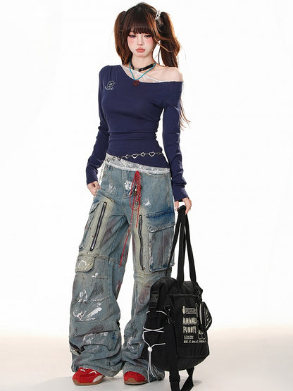 ブルーのワイドレッグカットデザイン、ジッパー付きカーゴジーンズ、スプレーペイントプリント