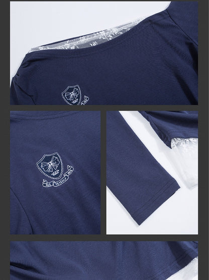 Marineblaues Top mit asymmetrischem Ausschnitt und Spitzenakzenten