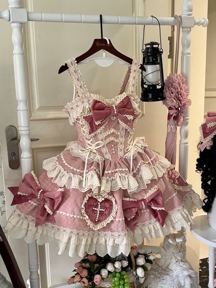 ピンクの蝶結びとハート型のアップリケスカートのスイートロリータドレス