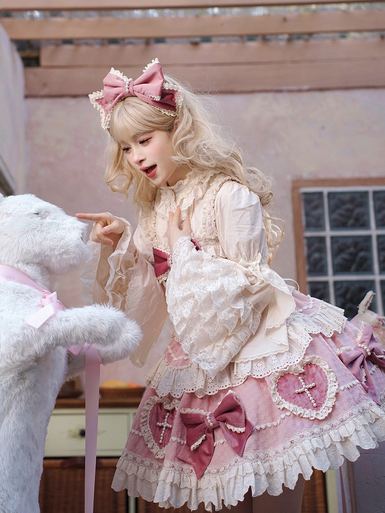 ピンクの蝶結びとハート型のアップリケスカートのスイートロリータドレス