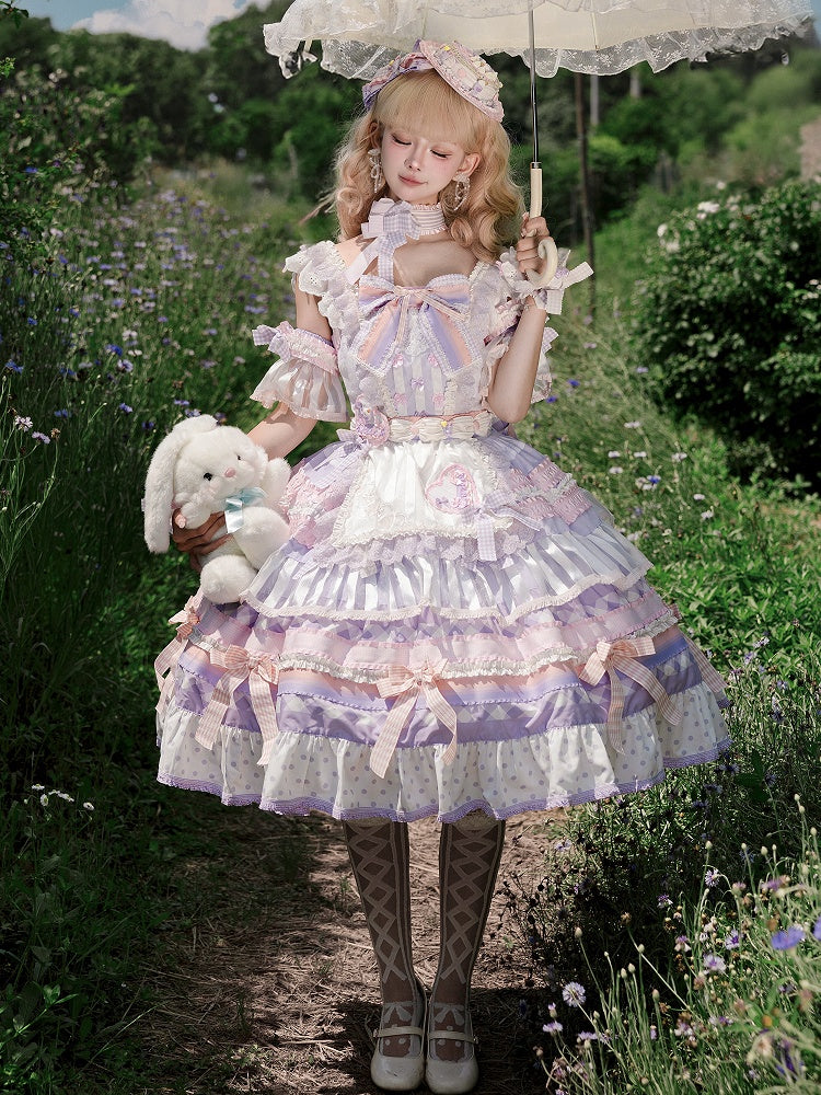 Gestuftes Lolita-Rock mit lila Akzenten, Kuchen-Taro-Paste, süßes Schleifenkleid