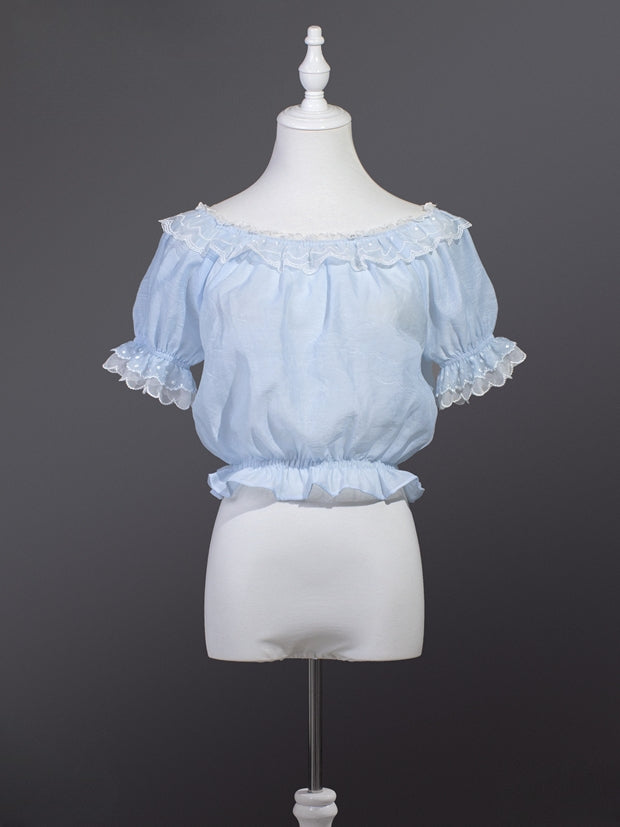 ライトブルーのショートパフスリーブシフォンブラウス