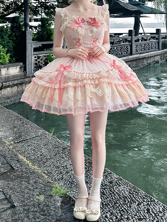 Süßes Lolita-Kleid mit Schleife, flatterndes rosa Mieder mit Schnürung, hoch taillierte Ärmel mit großem, abnehmbarem Pulloverrock