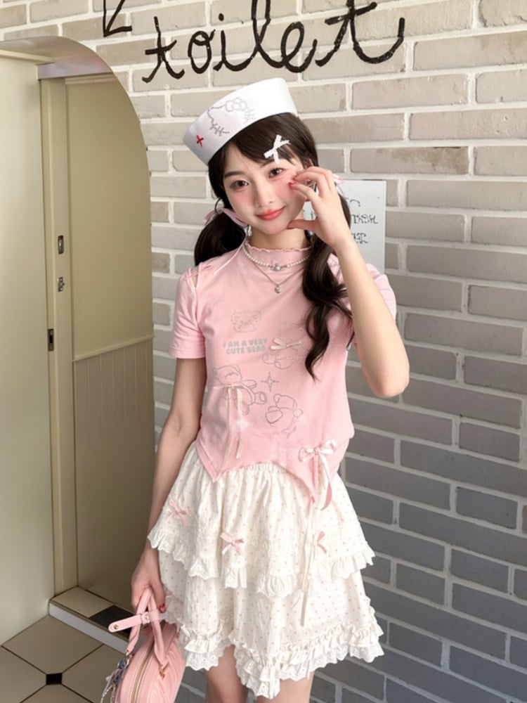 T-Shirt-Saum, gebogen, rosa Rüschen-Ausschnitt, Teddybär-Strasssteine, Schleifen-Akzente