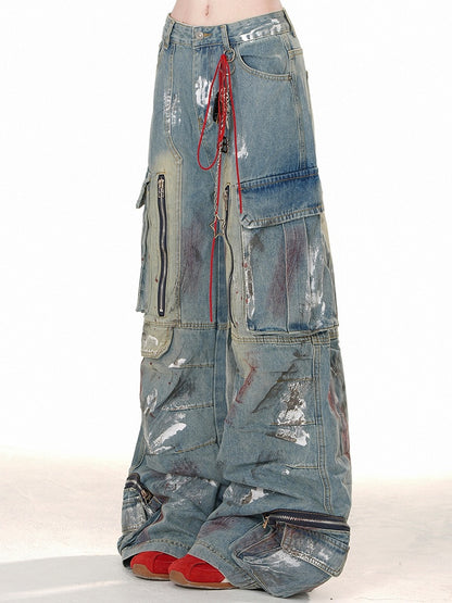 ブルーのワイドレッグカットデザイン、ジッパー付きカーゴジーンズ、スプレーペイントプリント