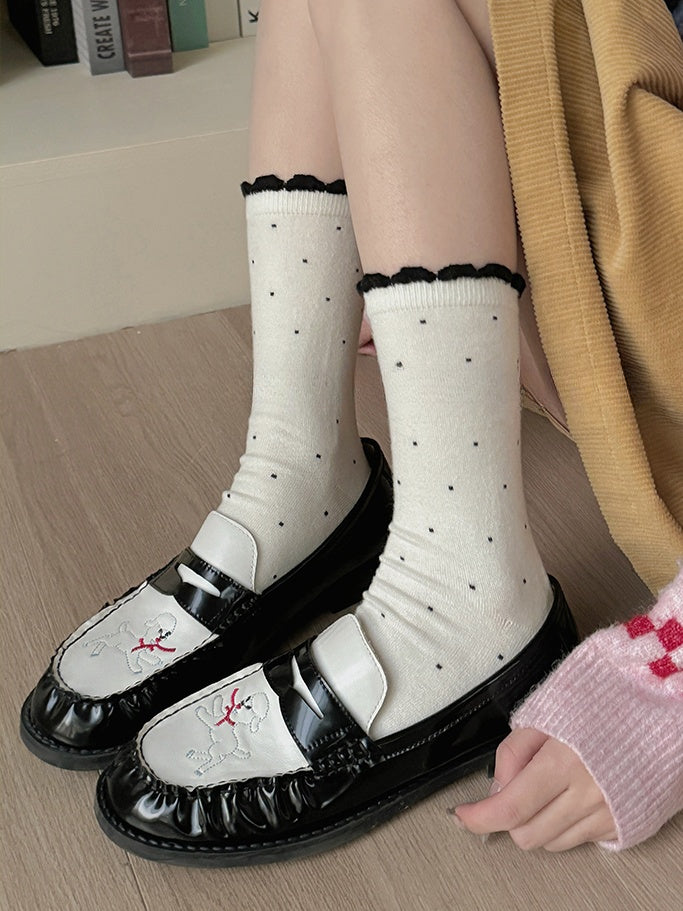 Wadenlange Socken mit gerüschtem Bündchen und Tupfenmuster