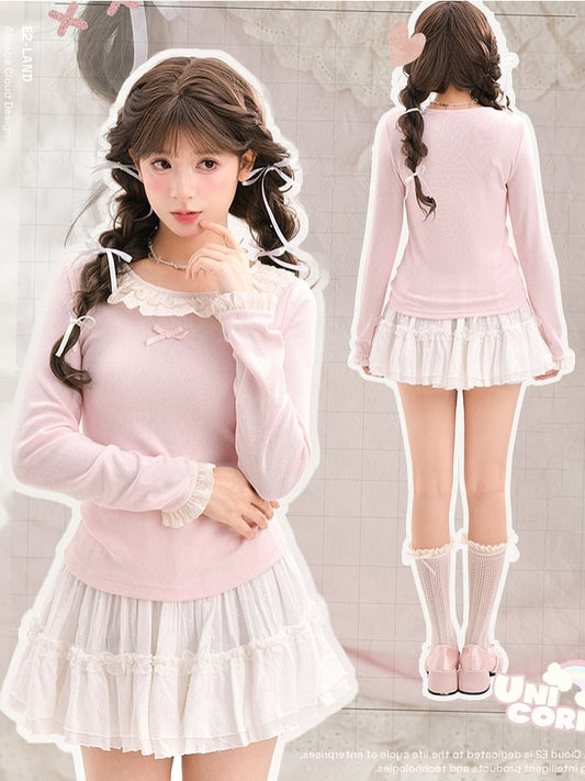 Rosafarbenes Slim-Fit-Top mit Rundhalsausschnitt und Spitzenbesatz