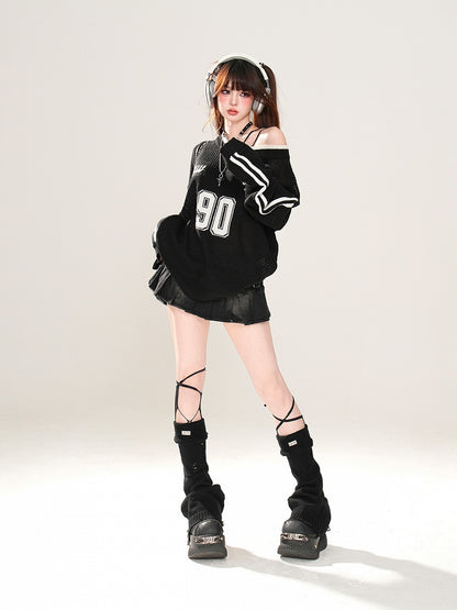 Schwarz/weißes, asymmetrisches Oberteil mit Sonnenschutz und Hohlsaum